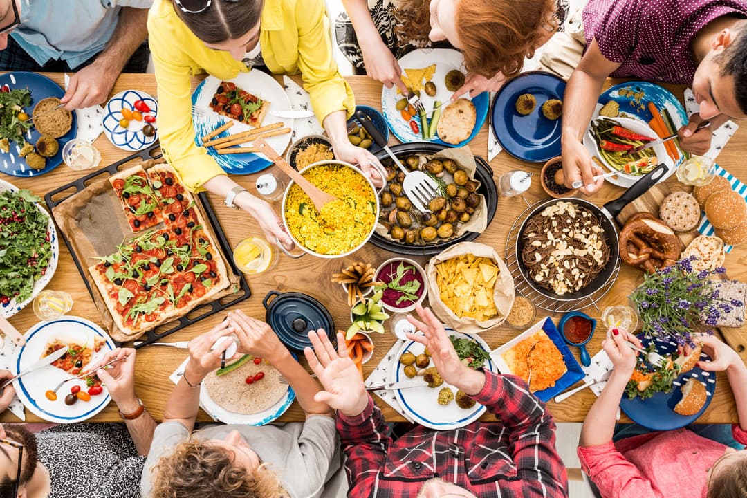 Happy people sharing food